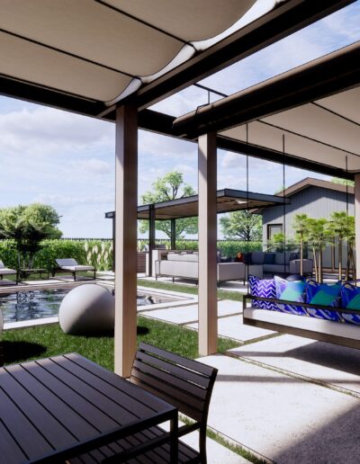 Modern outdoor patio with comfortable seating, poolside view, covered by a pergola, surrounded by lush greenery under a clear sky.