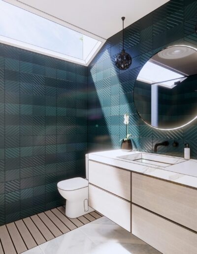 A modern bathroom with blue geometric tiles, a circular mirror above a floating vanity, a toilet, and a skylight.